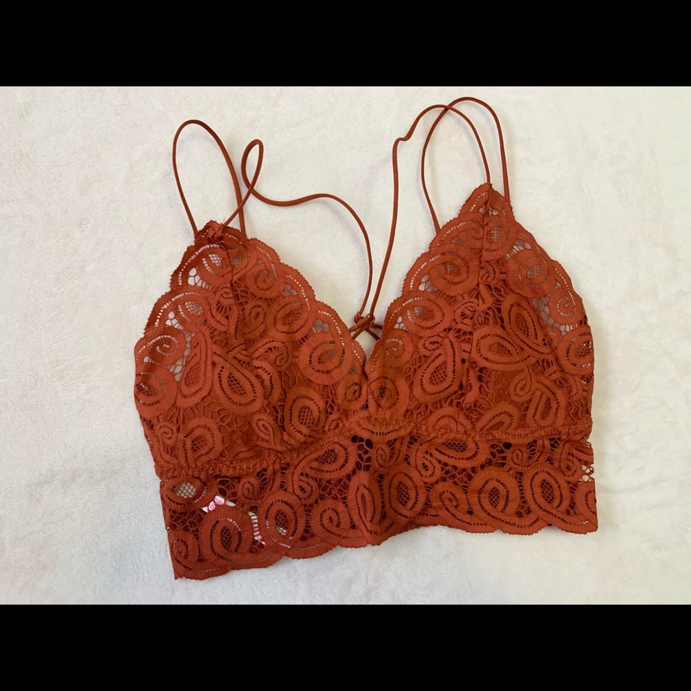 Rust orange lace VS Pink bralette